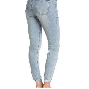 Distressed Mid-rise Skinny Jeans